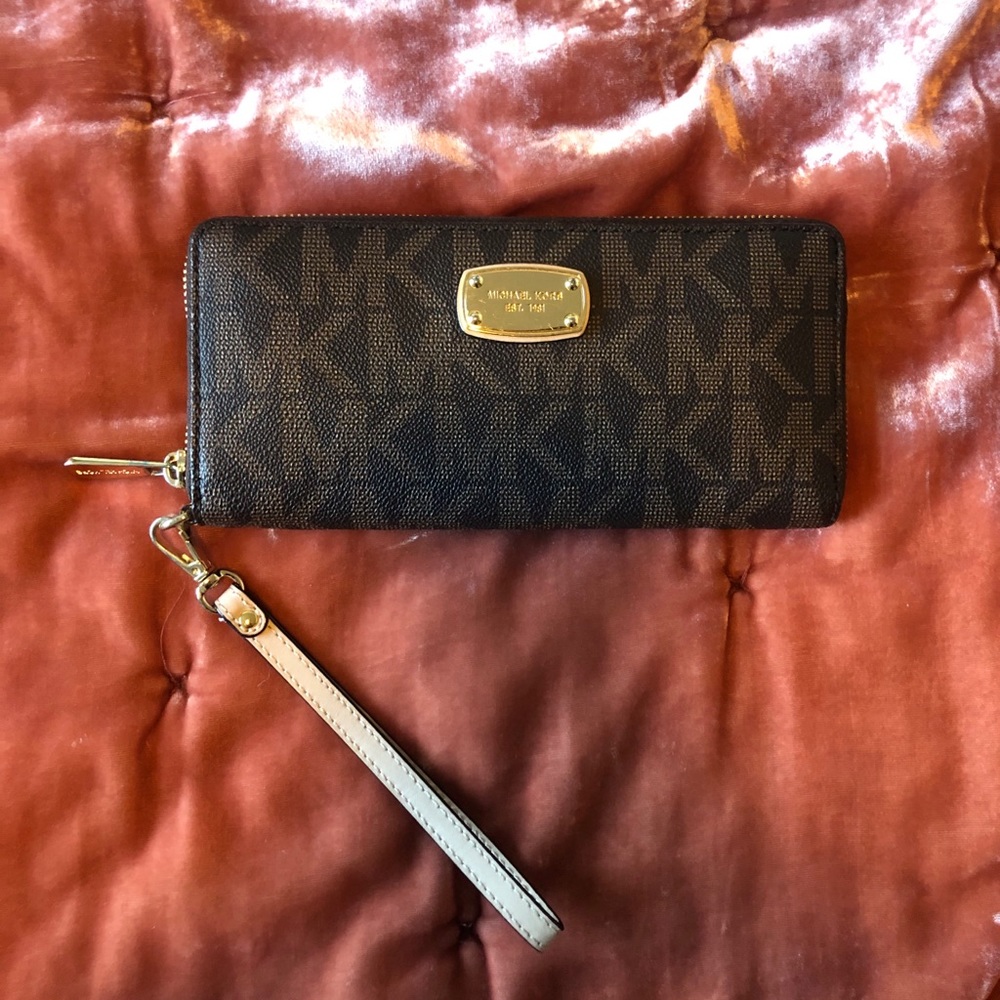 Brown and gold Michael Kors monogram wristlet!